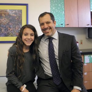 Dr. Michael G. Vitale with his patient, Samantha B.