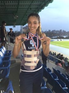 Kate with her medals and Rigo brace